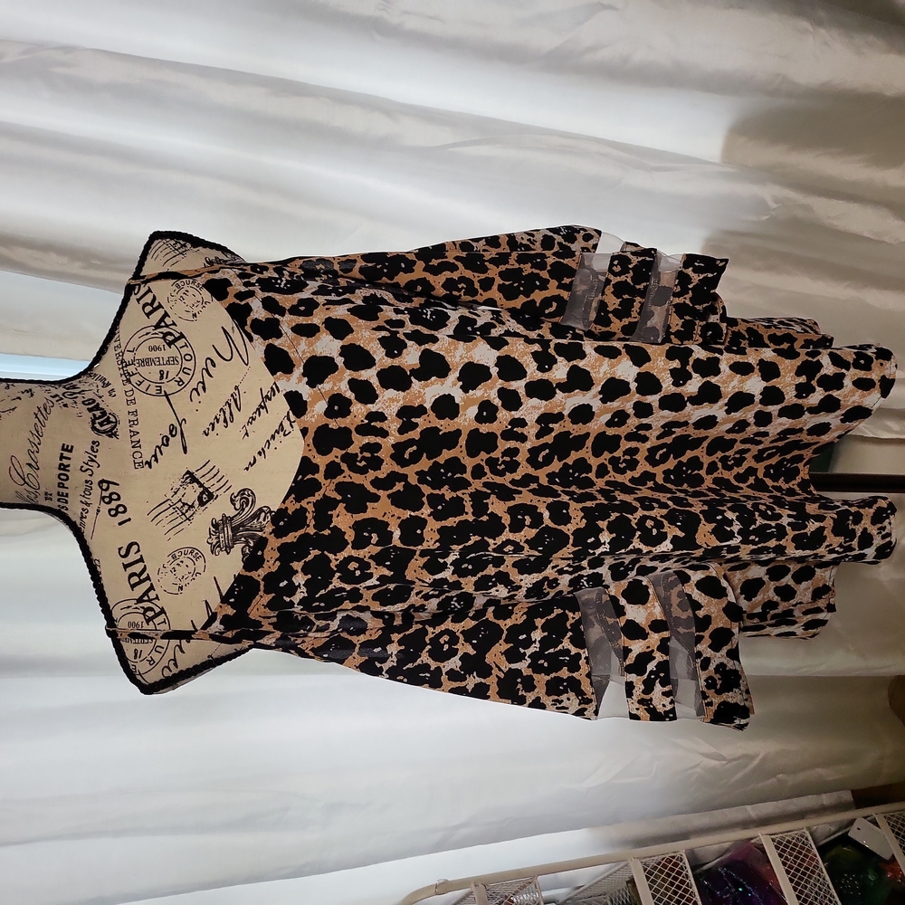 Leopard print cold shoulder top size L